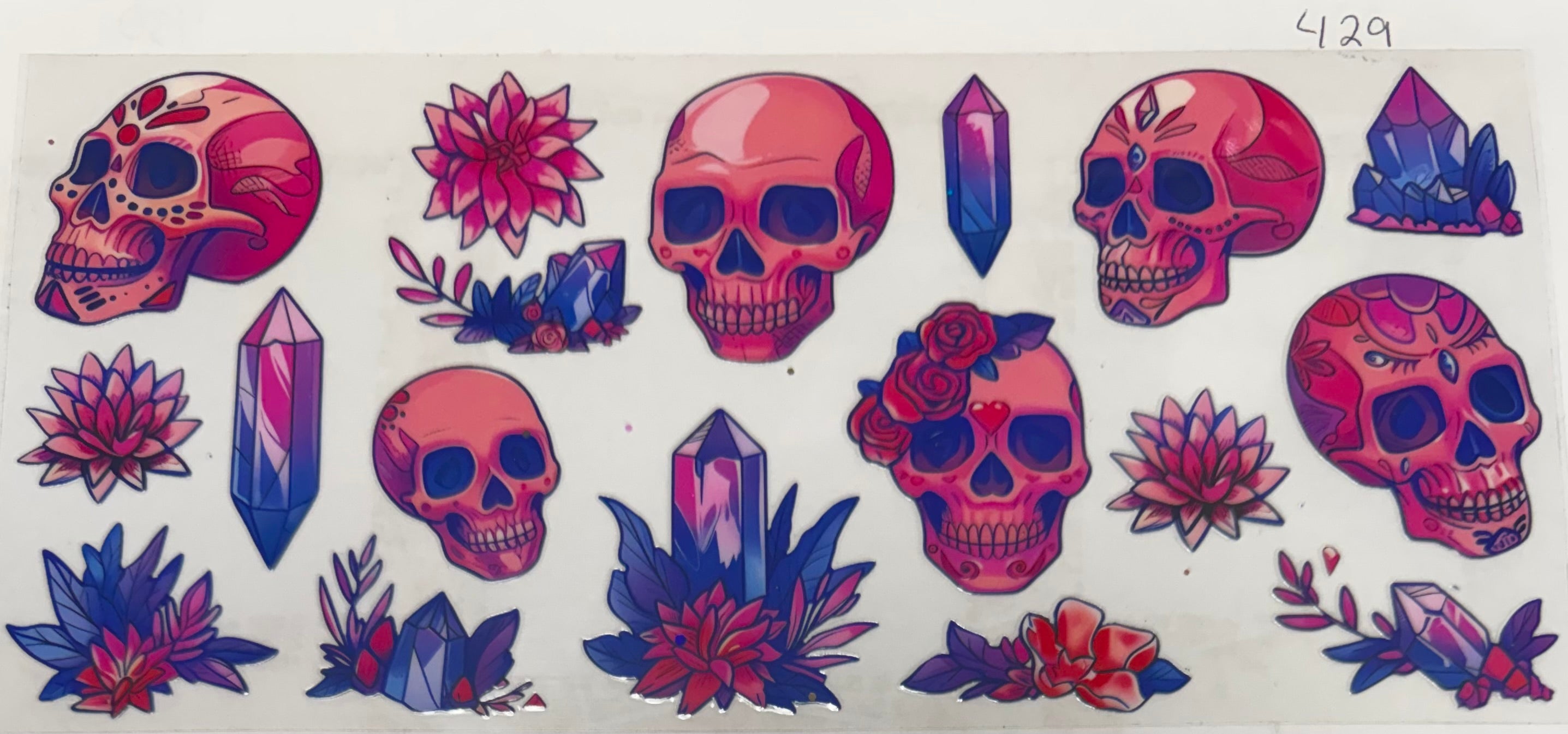 #429 Skulls crystals flowers