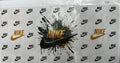 #134 Nike with black and gold