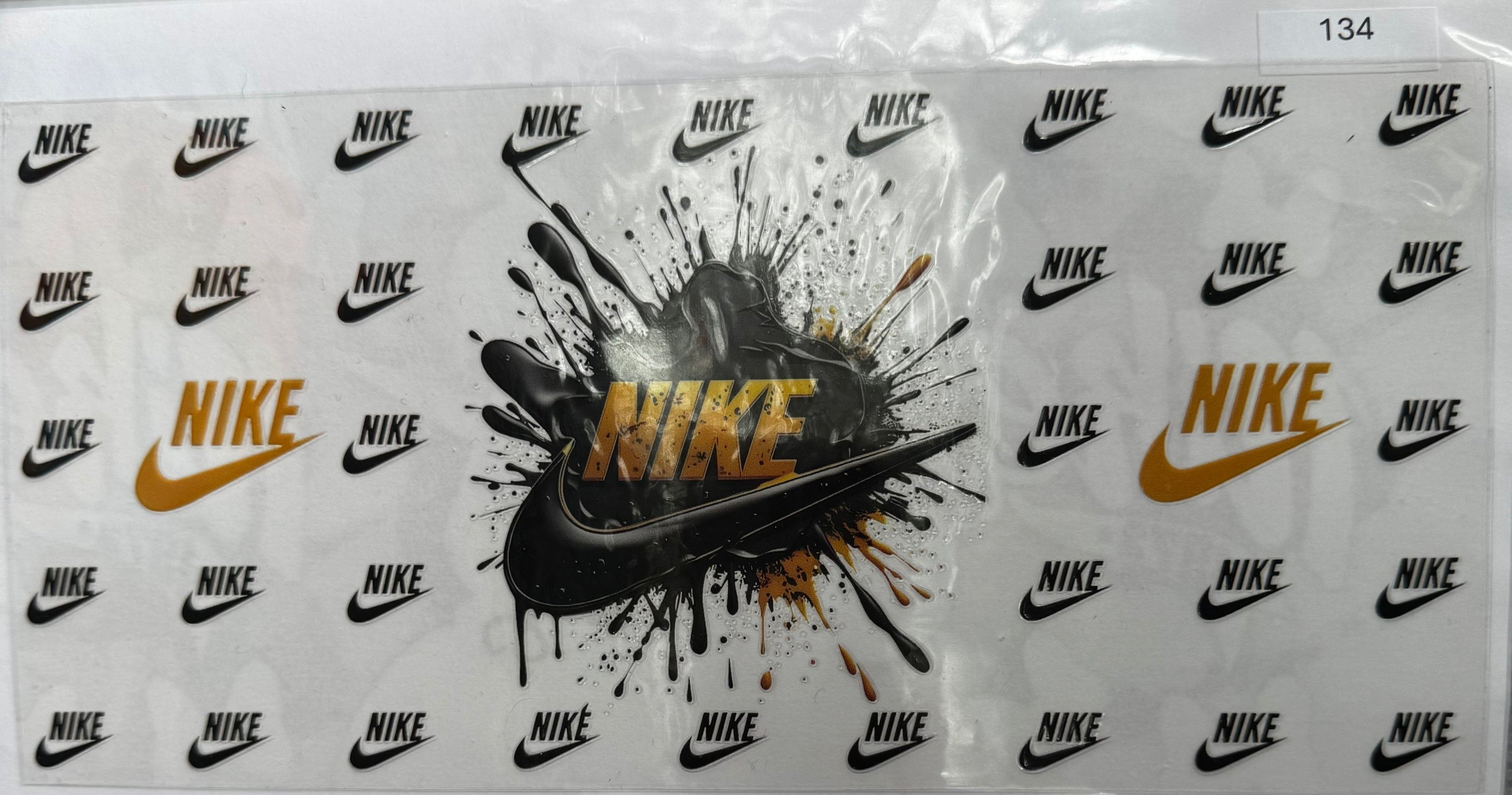 #134 Nike with black and gold